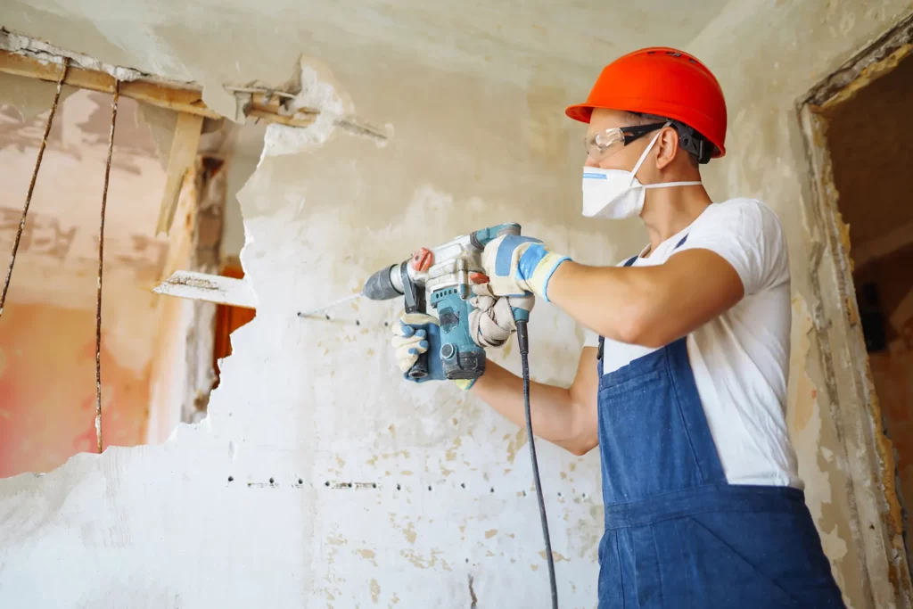 Professional offering interior and exterior house painting services for commercial remodeling projects.